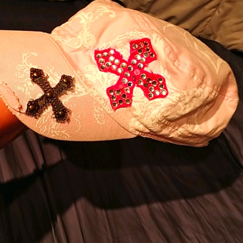 pink hat with cross